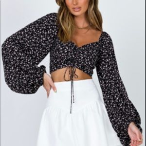 Long sleeve black crop top with pink and white flowers